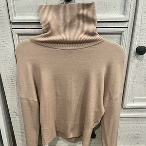 Brand new, never worn, XS womens turtleneck sweater with open back